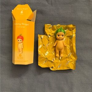 Green and Yellow Doll with Accessories